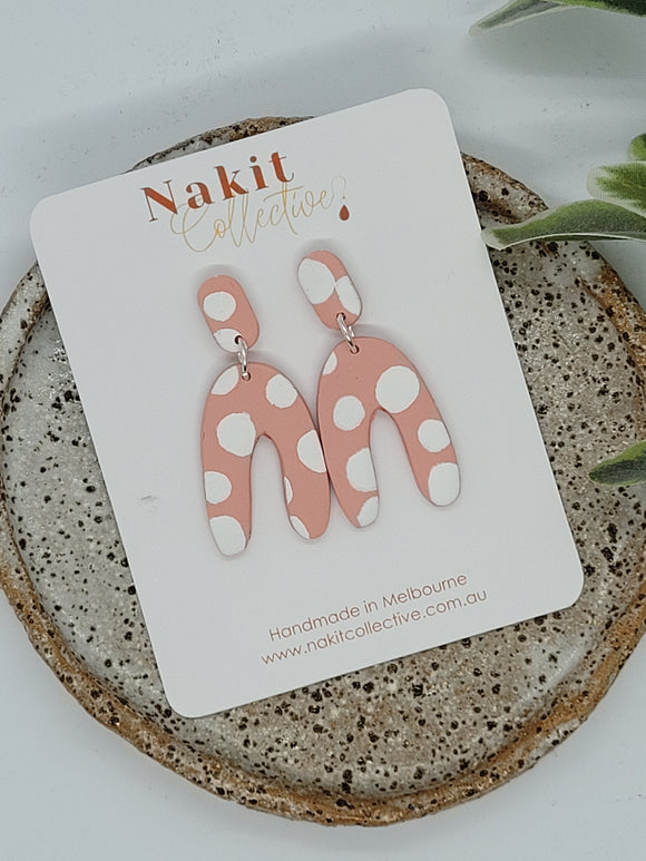 Pink and white dot thin arch dangle earrings