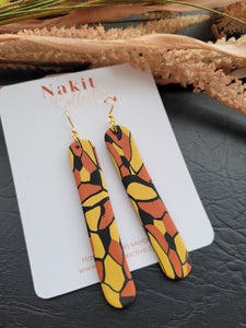 Black, mustard and terracotta tribal long dangle earrings