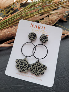 Sage and black circle and flower leopard dangle earrings